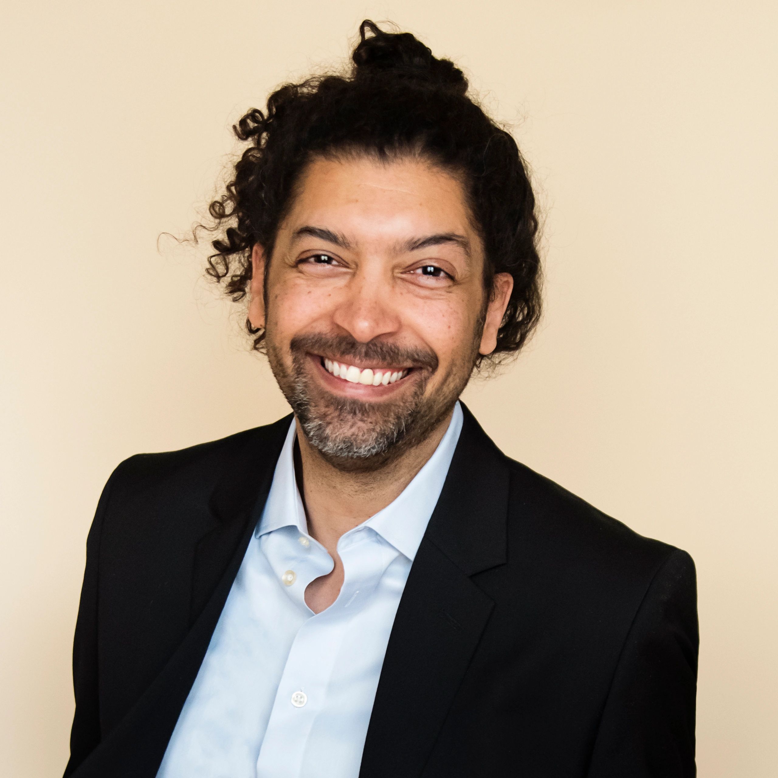 Professional headshot of a smiling professional