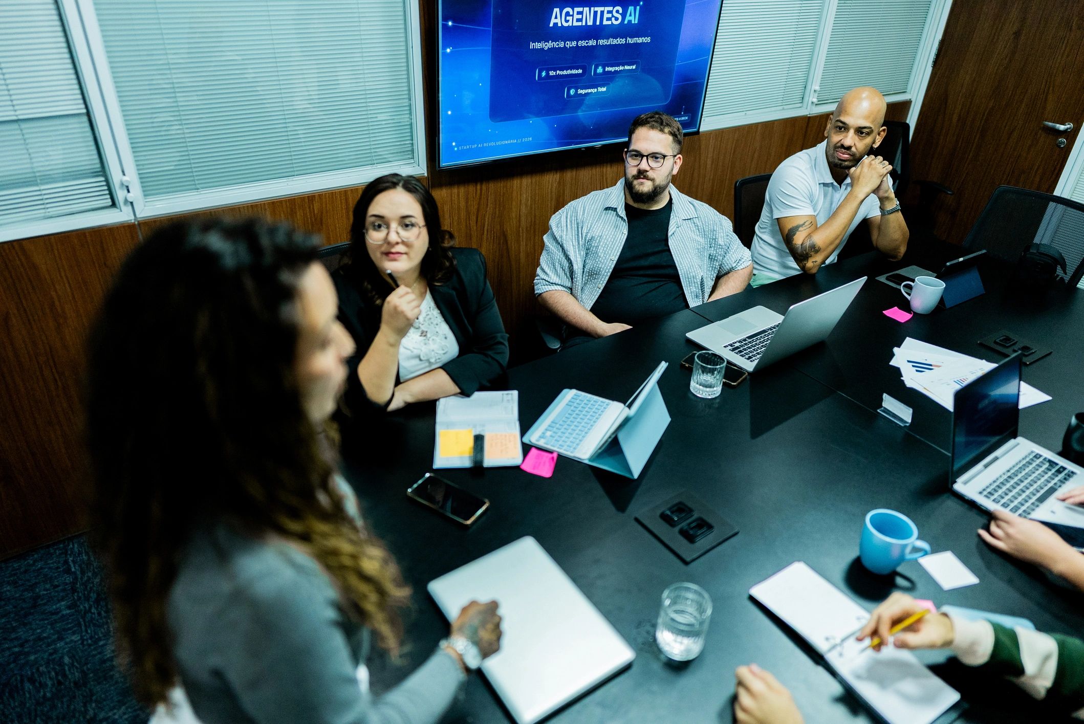 IT services team collaborating in a meeting