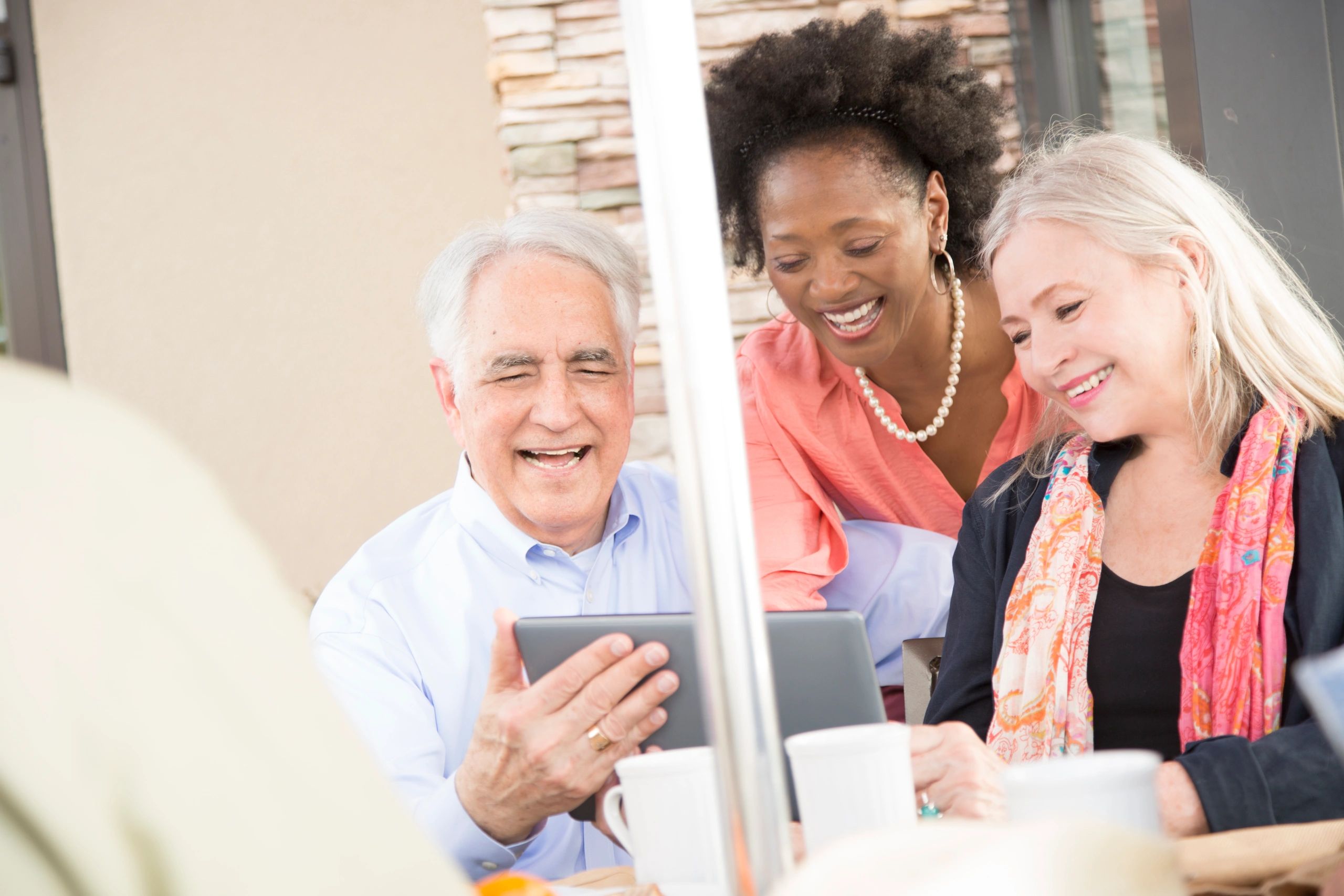 Residents using a tablet together